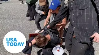 Jodie Sweetin, protesters pushed by police during protests | USA TODAY