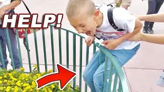 Oh NO! He Got His KNEES Stuck In Iron Fence!