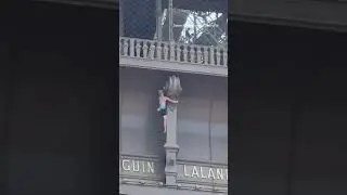 Person Spotted Scaling Eiffel Tower Hours Before Olympics Closing Ceremony