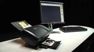 Feeding 4x6-inch photos into the Kodak Picture Saver Scanning System PS50/PS80