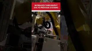 High-speed precision robotic labeling system with FANUC robots 