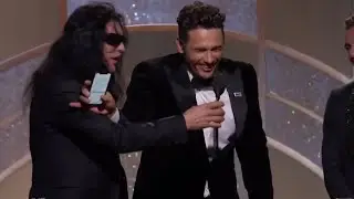 Tommy Wiseau tries to steal mic from James Franco but fails during 2018 Golden Globes speech