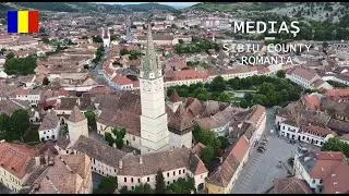 Aerial views of Saint Margaret's Church and the Mediaș city center in Sibiu County, Romania
