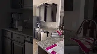 Installing kitchen backsplash in our builder grade home 