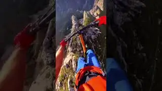 Bike Rider On The Edge Of 2000FT Cliffs 