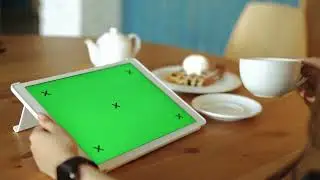 Hands Holding Digital Tablet With Green Screen At Breakfast Circa 4k