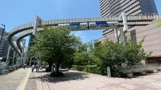 Chiba Urban Monorail (Japan) view of two trains around curve below.