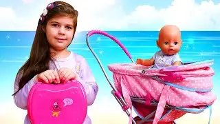 Курорт для Беби Бон Эмили: одеваем куклу на море! Видео для девочек про кукол Baby Born