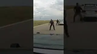 Sheriffs Sergeant dashes to safety as his vehicle gets rammed