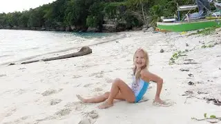 Children playing on the beach 4K