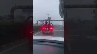 Car trying to cross over low underpass