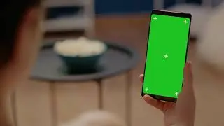 Green Screen | Chroma Key | close up on mobile phone with vertical green screen | 4K | HD