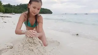 Children playing on the beach 4K