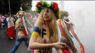 FEMEN activists strip in protest against Euro 2012