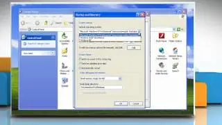 How to specify the default operating system for start-up on a Windows® XP-based PC?