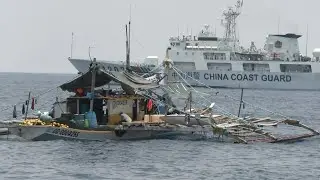 Chinese vessels shadow Philippine civilian convoy sailing towards disputed reef | AFP