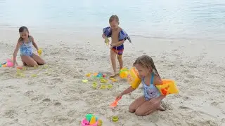 Children playing on the beach 4k