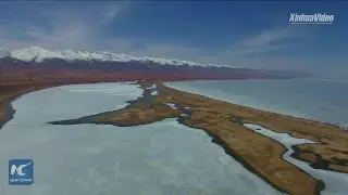 Stunning aerial view of Qinghai Lake ice melting