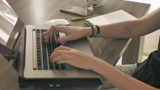 Hands of a girl working on a computer Non Copyrighted