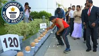 Most coconuts smashed in a minute! - Guinness World Records