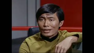 Captain Kirk's holds informal staff meeting with Chekov, Sulu, and Uhura