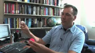 How does a Trojan asteroid share Earth's orbit?