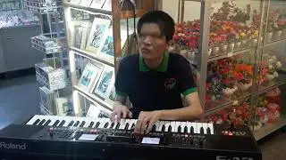 An eyeless man playing piano at the War Museum - Vietnam Incredible Land Tours