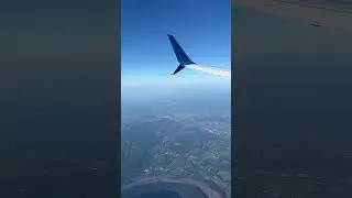 View from Plane Landing in New England at the beginning of fall.