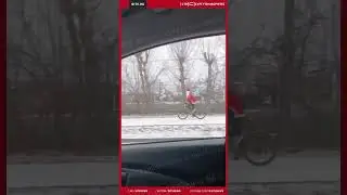 Дед мороз на велосипеде 