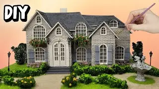 Do it yourself mansion with a cardboard fountain / DIY
