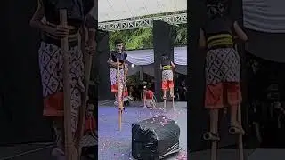 Bamboo stilts game (egrang bambu)