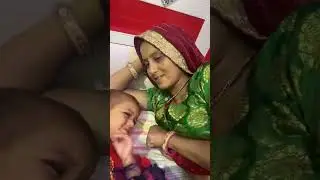 baby feeding mother milk with father help