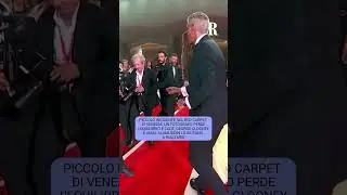 Incidente sul red carpet a Venezia: Clooney e Amal Alamuddin aiutano un fotografo a rialzarsi