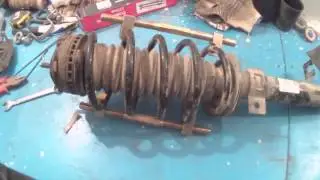 Снимаем передние стойки амортизаторов на Ford Fusion