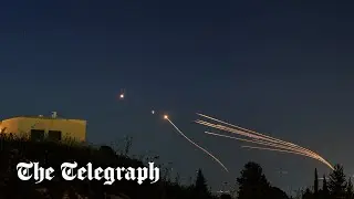 Hezbollah fires dozens of missiles at Israel