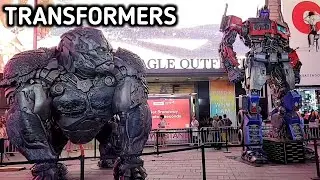 Transformers: Rise of the Beasts. Optimus Prime with Optimus Primal in Times Square NYC