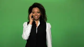 Young woman on a business call on a green screen || green screen ||no copyright