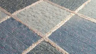 From denim squares. Blank on the bag.