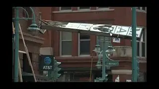 Historic sign in Milwaukee's Third Ward blows over due to high winds