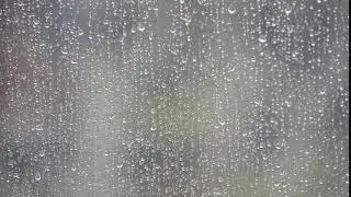 free stock footage: Drops of rain on the window at full hd