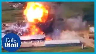 Shocking moment Ukraine bombs Russian army warehouse sky high