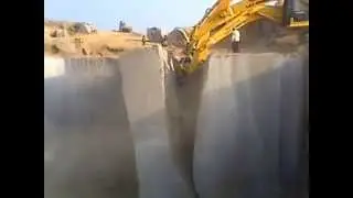 L&T komatsu - How they throw big Blocks cutting