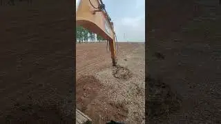 The process of clearing agricultural land- Good tools and machinery make work easy