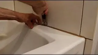 How to remove old silicone around a bathtub and replace with new