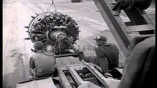 Mechanics replace damaged engine of a B-29 bomber of US Army Air Force at their b...HD Stock Footage