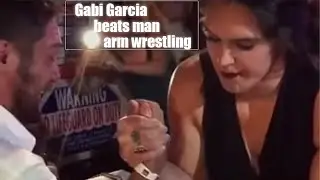 Mma fighter Gabi Garcia beats man arm wrestling