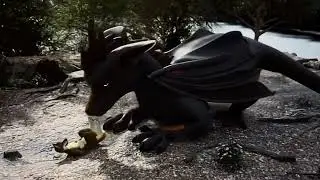 Dragon eating a tiny human dog ￼