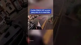 Moment brave cyclist fends off scooter gang that tries to steal his bike