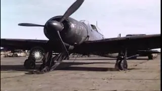 Tractor tows Japanese plane at Atsugi Airdrome in Japan. HD Stock Footage