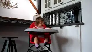 Baby rocking out to NOFX while eating lunch